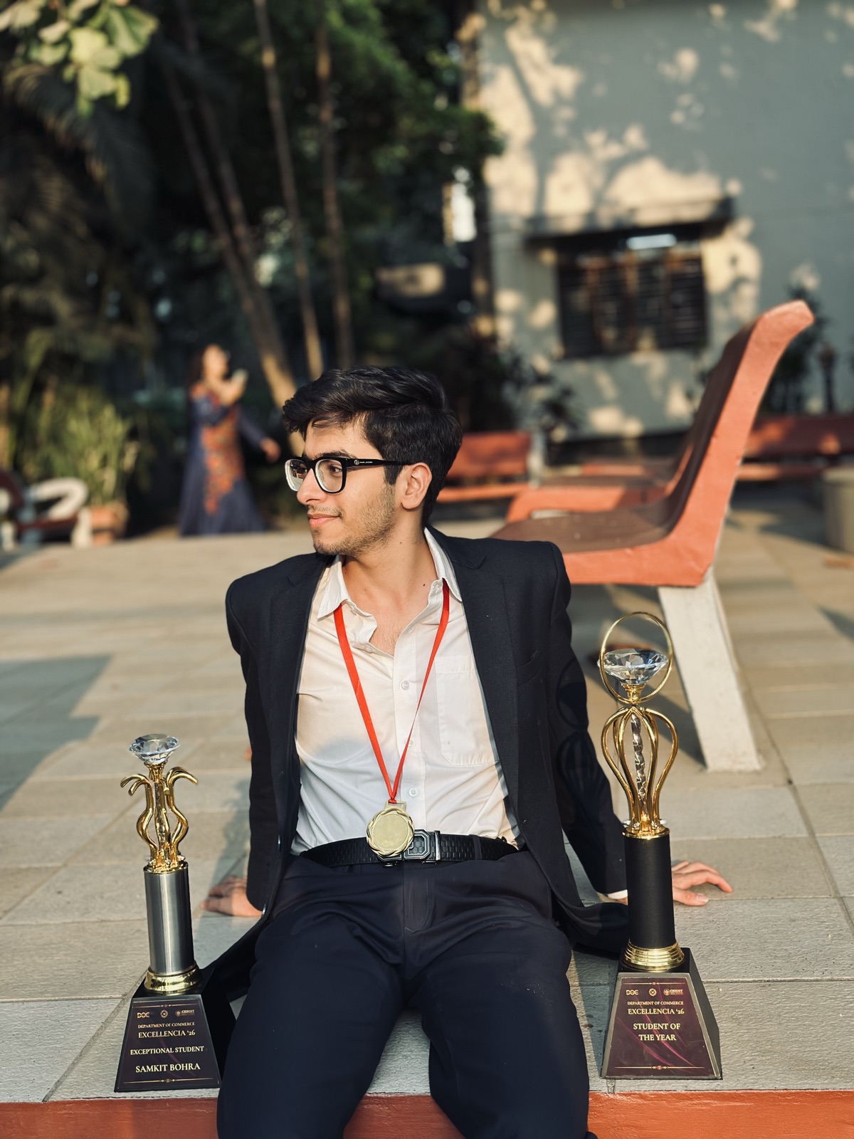 Samkit with his Student of the Year trophies